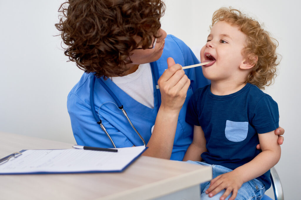 Nurse Examining Little Boy